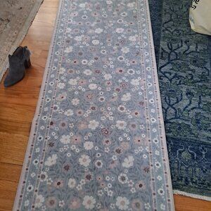2x8 runner rug m Wyatt & Ash. The design features a light blue and grey color pa